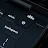 Close-up of the Googlebook keyboard corner showing the power button, volume keys, backspace key, and speakers.