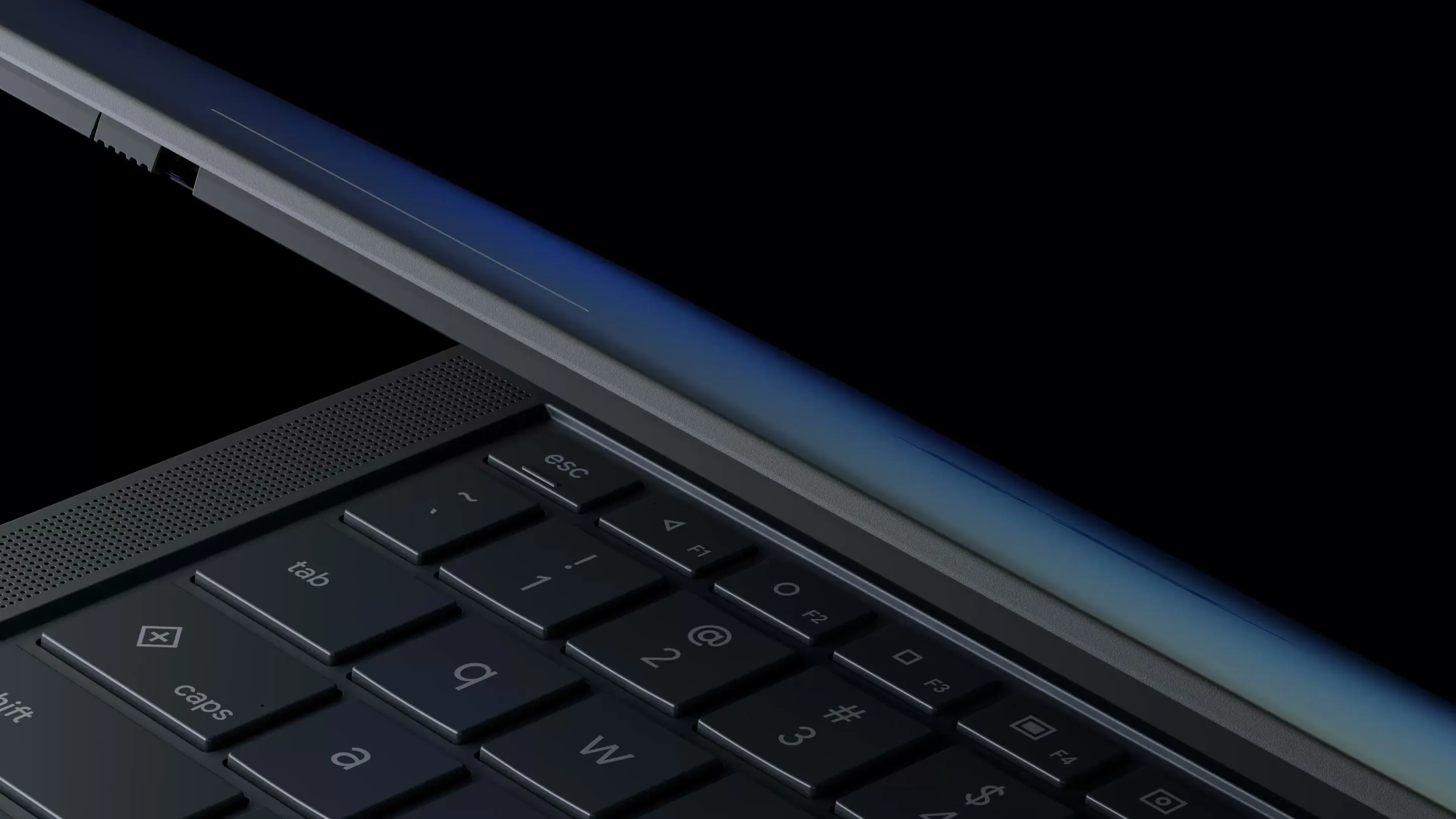Googlebook laptop slowly opening, viewed from a low angle showing the keyboard and hinge.