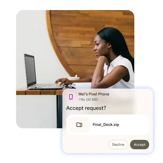 A person  is focused on their laptop at a desk. A notification layered above prompts them to accept a file transfer request. The request is from 'Mel's Pixel Phone' to receive a 30 MB file called 'Final_Deck.zip'.