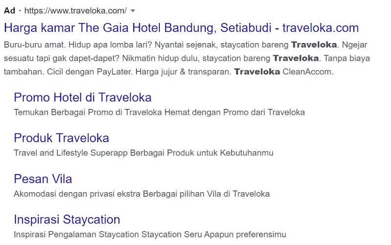 A Google search engine results page (SERP) displaying a Traveloka advertisement of The Dewi Sun Sun Suite in Indonesia