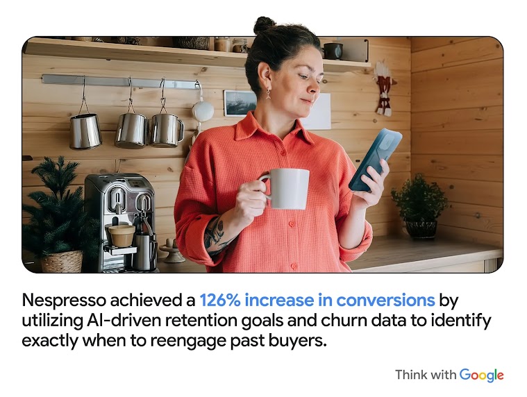 A woman looks at her phone while holding a coffee mug. Nespresso achieved a 126% increase in conversions by utilizing AI-driven retention goals and churn data to identify exactly when to reengage past buyers.