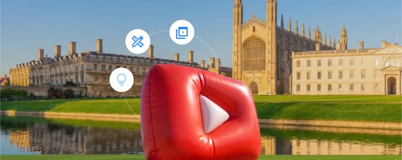 A large inflatable red YouTube play button sits on a lawn in front of King's College Chapel, Cambridge. Three circular blue icons representing a lightbulb, drafting tools, and media players float in an arc above it.