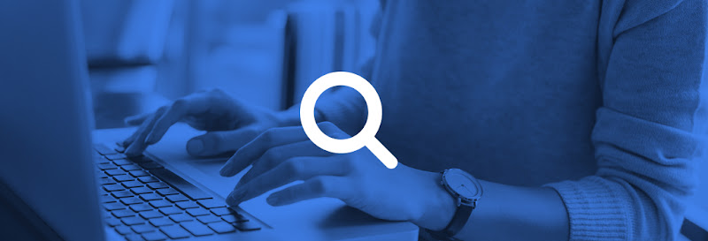 A person typing on a laptop