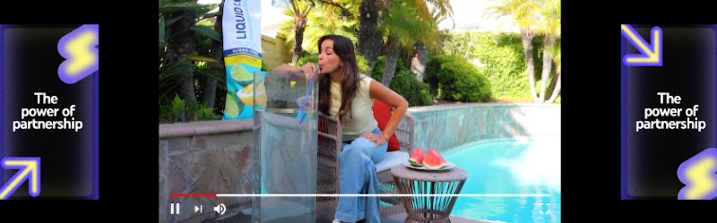 YouTube content creator Pierson sits by a pool, drinking from a large beverage container with watermelon slices nearby, showcasing how brand partnerships drive engagement and help connect with fans.