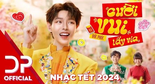 The video thumbnail shows Vietnamese singer Đức Phúc smiling and posing in a brightly colored, festive setting that resembles a stage, for his Tết 2024 music video, "CƯỜI VUI LẤY VÍA."