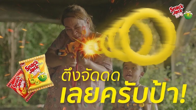 YouTube Works Awards Southeast Asia 2026 Winner thumbnail for 'Snack Jack Ring | Mother Strike' by Digital Next Solutions Co., Ltd. and Choojai and Friends. The image displays original and paprika flavored bags of Snack Jack Ring with their signature green mascot against a dark backdrop under 'The Big Bang' award category.