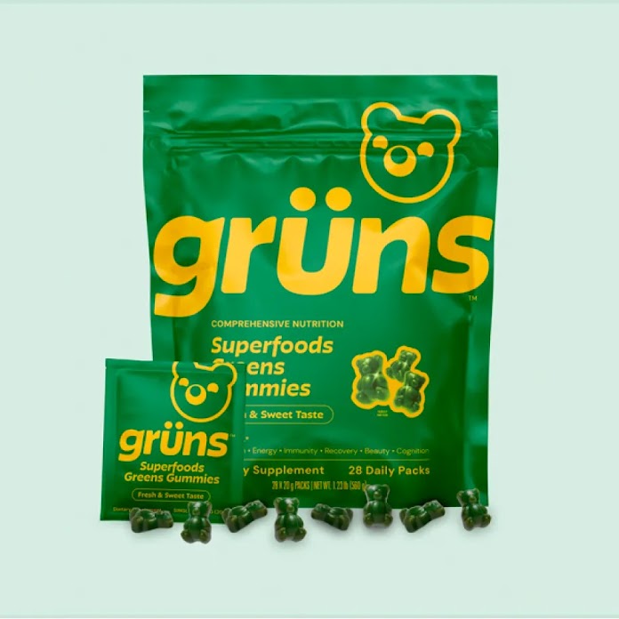 Grüns Superfoods Greens Gummies packaging with a large pouch, small box, and gummy bears.