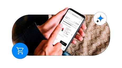 Unas manos sosteniendo un smartphone y pulsando el botón de tramitar pedido en una tienda de ropa online. Se muestra un icono azul de carrito de compra en la esquina inferior izquierda y una estrella de Gemini en la superior derecha.