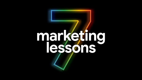 On a black background, a large number seven, outlined with rainbow colors, appears behind white text that reads: marketing lessons. 