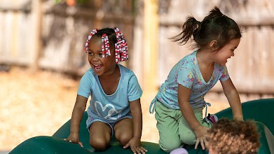 Young kids playing together outside.