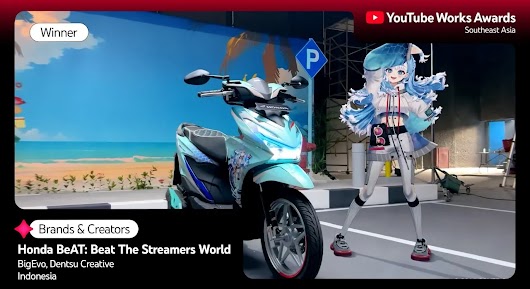 A light blue Honda motorcycle with graphics is parked in an indoor studio setting with a beach mural on the wall. A tall, animated female character with blue hair stands next to the bike. The overlay text reads: "Winner," "Brands & Creators," and "Honda BeAT: Beat The Streamers World," followed by agency names and "Indonesia."