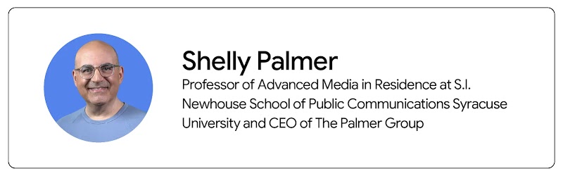 Shelly Palmer, CEO of The Palmer Group and advanced media professor in residence at Syracuse Univ. appears from the shoulders up. Palmer has light skin, a shaved head, and wears a light blue pullover and glasses.