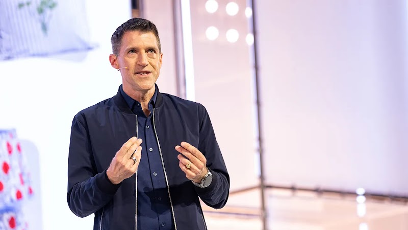 A photo of Dan Taylor, vice president of global ads at Google, giving a keynote at an event. 