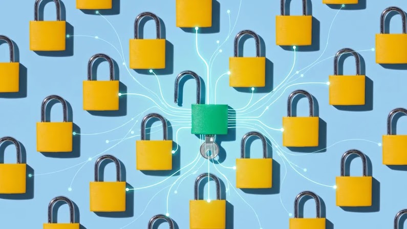 An array of closed brass padlocks appear on a light blue background. Circuits radiate from an opened, green padlock in the center, key inserted, to the closed ones.