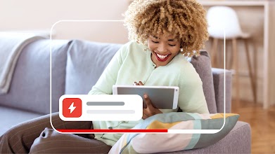 Image of a customer looking at their tablet surrounded by the YouTube UI.