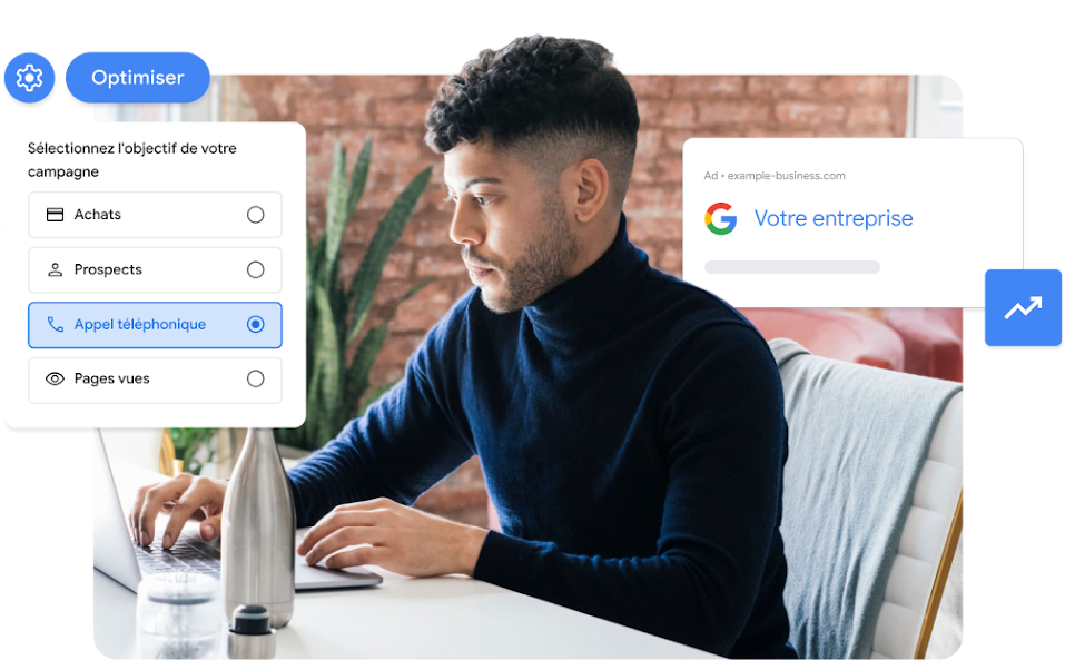 Un homme portant un pull à col roulé bleu configure sa prochaine campagne Google Ads sur son ordinateur portable.