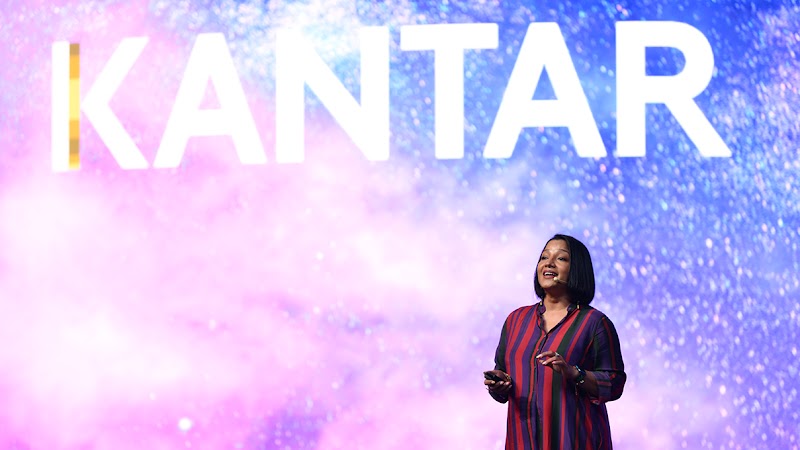 Irene Joshy, Head of Creative at Kantar APAC, is on stage with ‘Kantar’ behind her, as she shares video marketing insights on creating effective video campaigns with creative, personalised, and engaging content by collaborating with YouTubers.