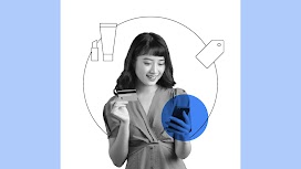 01. Shopper trends to prioritize. A woman holding a credit card while online shopping on her mobile phone, representing consumer buying behavior and retail trends and insights during mega sale days.