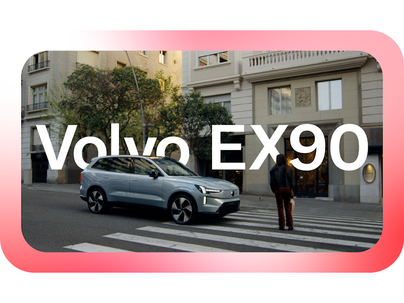 We see an image of a person crossing the street and a car approaching the crosswalk with the words Volvo EX90 across the middle