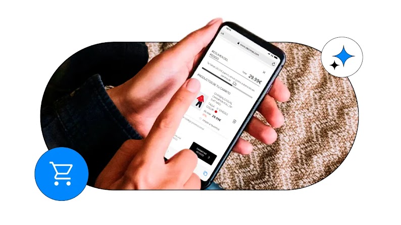 Unas manos sosteniendo un smartphone y pulsando el botón de tramitar pedido en una tienda de ropa online. Se muestra un icono azul de carrito de compra en la esquina inferior izquierda y una estrella de Gemini en la superior derecha.