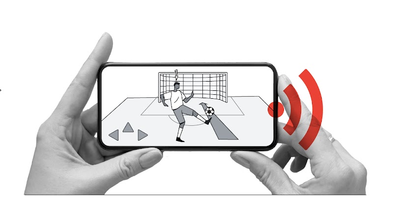 Two hands hold a mobile phone. On the screen, a football game is being played. The action is close to the goalmouth. A red Wi-Fi icon overlays.