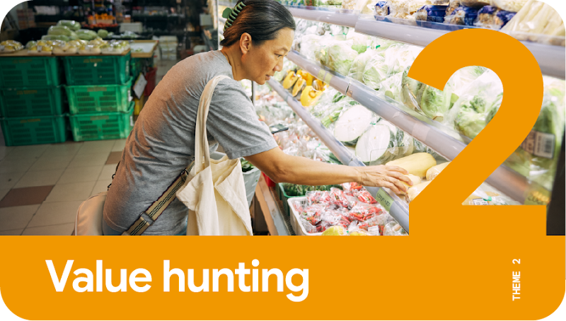 Theme 2: Value hunting. A middle-aged woman grocery shopping in the supermarket, looking through the options in the vegetable section to make a purchase decision with the best value overall.