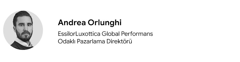 EssilorLuxottica Global Performans Odaklı Pazarlama Direktörü Andrea Orlunghi'nin omuzlarından yukarısı görünecek şekilde fotoğrafına yer verilmiştir. Orlunghi açık tenli, kısa koyu renk saçlı ve düzgün sakal ve bıyıklıdır, koyu renkli bisiklet yaka kazağ