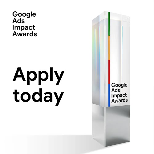 A clear and silver-cubed Google Ads Impact Award trophy with the prompt to “Apply today” at the center. 