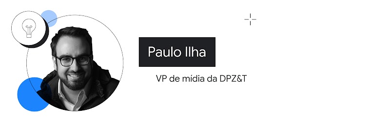 Retrato de Paulo Ilha, VP de Mídia da DPZ&T. Ele tem cabelos curtos e escuros, barba, bigode, e usa um par de óculos de armação quadrada.