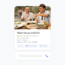 A greek restaurant’s Local Services Ads with two people dining and the restaurant’s essential  information.