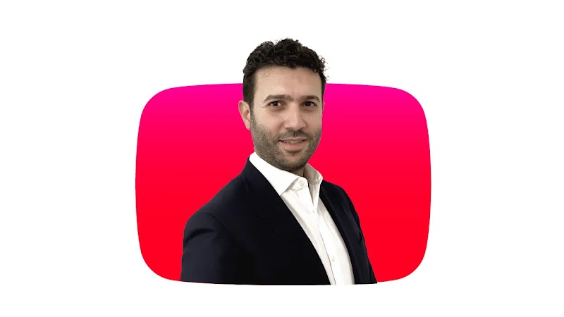 Headshot of Nabil Sleiman, Head of Marketing and Communications at Almarai, over a YouTube play icon, in a white background.
