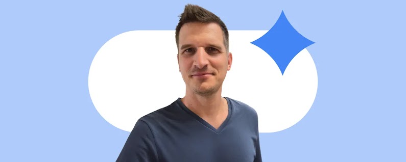 Benoit Veryser, marketing VP at Lysol, appears from the shoulders up. Veryser has light skin and dark brown hair, and wears a blue V-neck shirt