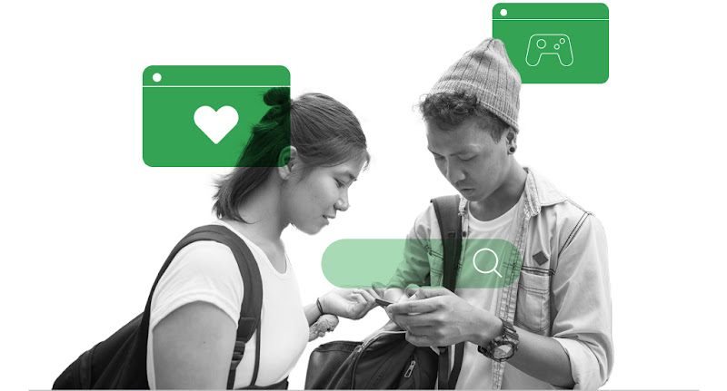 Two Filipinos using search on a mobile phone