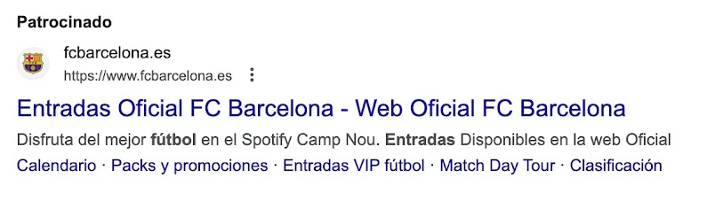 Ejemplo de anuncio de Google Ads del FC Barcelona donde se lee Entradas Oficial FC Barcelona Web Oficial y el escudo del equipo.