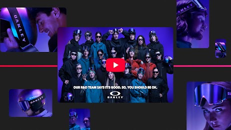 Collage Oakley con video centrale di sciatori e snowboarder con maschere da neve. Testo: "OUR R&D TEAM SAYS IT'S GOOD. SO, YOU SHOULD BE OK." Intorno, primi piani di atleti con maschere Oakley iridate su sfondo scuro e viola.