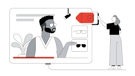 Vediamo una finestra di YouTube aperta su un video in cui un uomo indossa degli occhiali da sole. Sulla destra del video vediamo il feed dei prodotti con altri occhiali da sole. Al di fuori dello schermo una donna clicca su una delle immagini, evidenziata