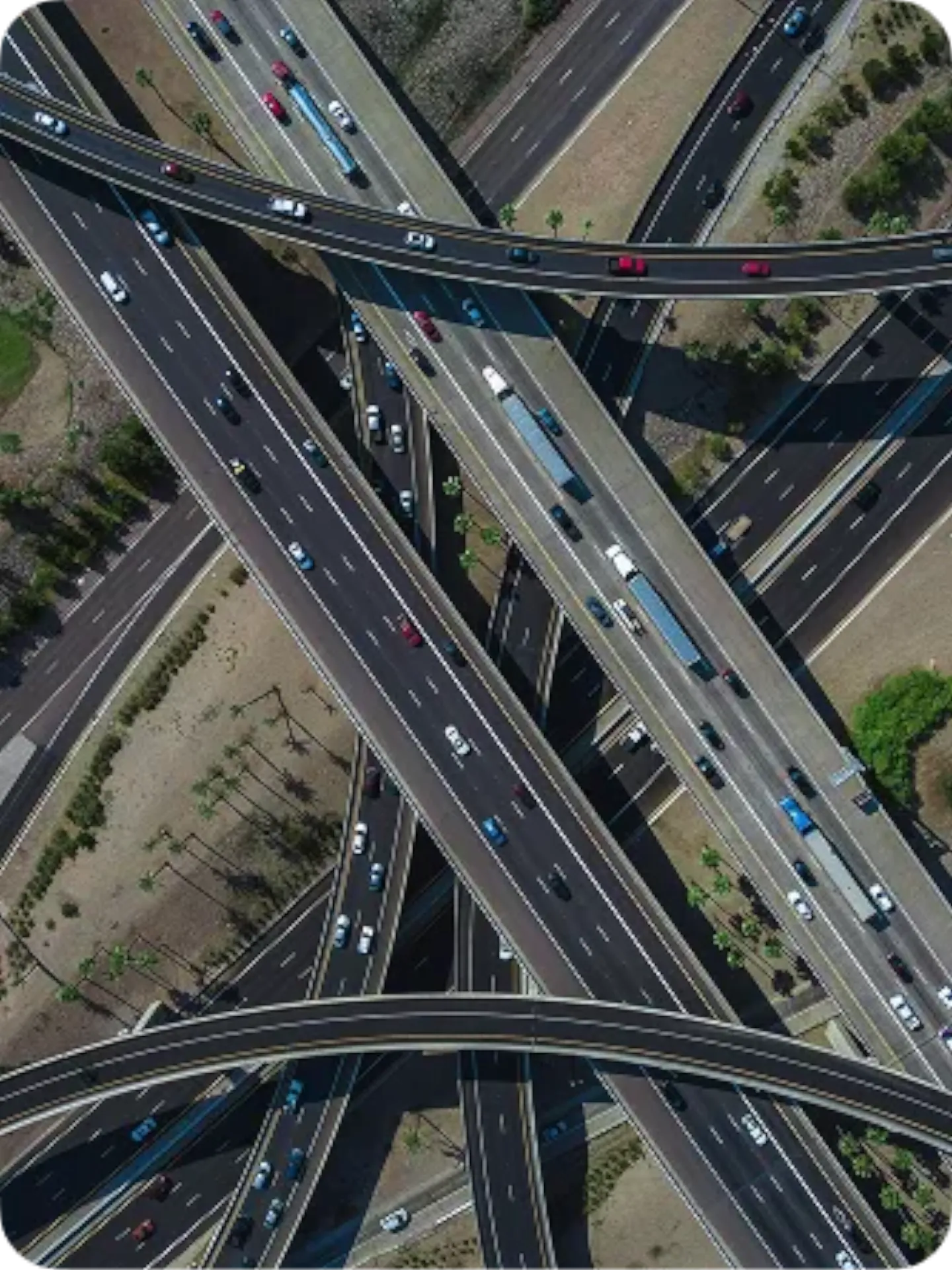 Aerial view of highway traffic interchange representing Waze for Cities traffic data sharing