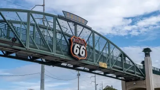 bridge featuring signage that says Tulsa and Route 66