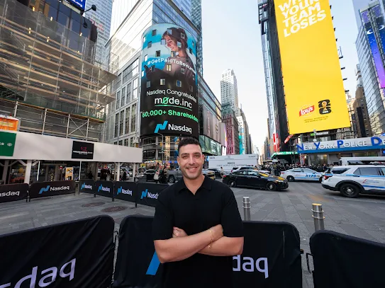 Dan Novaes in Times Square as the Nasdaq tower congratulates Mode.inc and its 60,000+ shareholders.