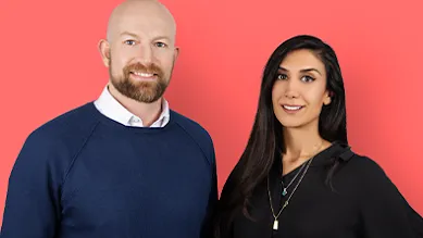 Cofounders Peter Fish and Shardi Nahavandi smile at a camera against a pink backdrop.