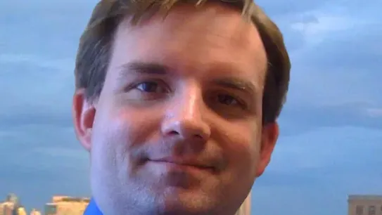 A portrait photograph of Michael D. Howell, the Chief Health Officer at Google
