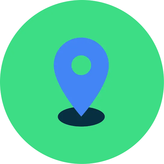 A blue map pin with a drop shadow beneath it, over a green circular background.