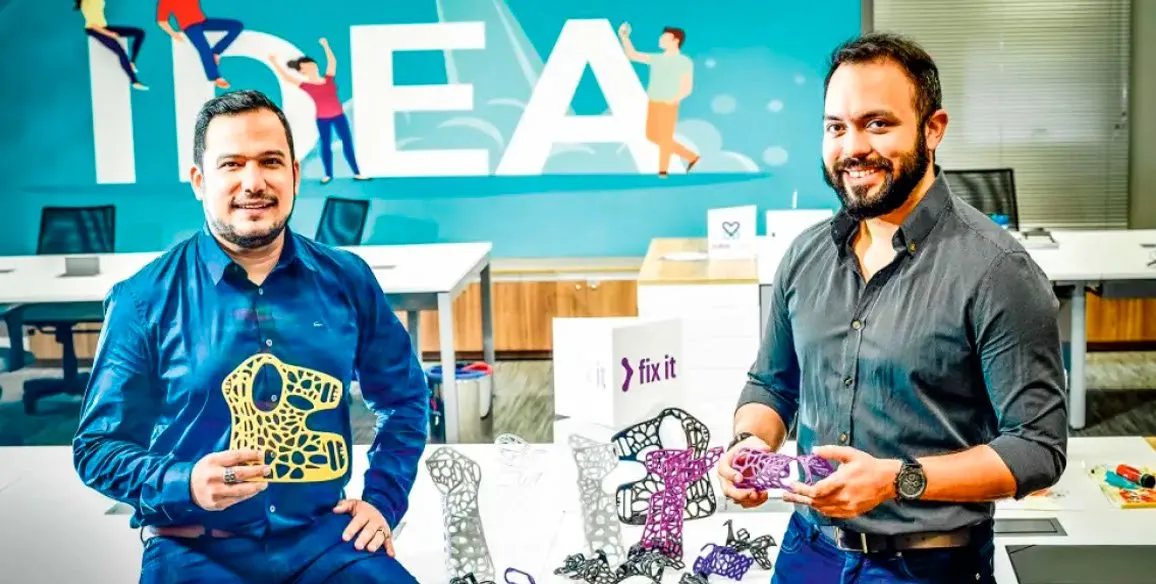 FixIt founders Felipe Neves and Hebert Costa with FixIt prosthetics