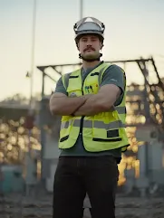 Square photo of person in vest