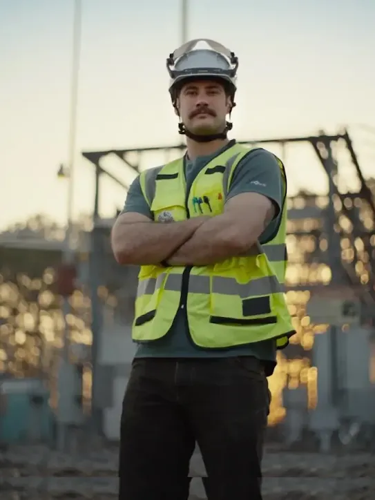 Square photo of person in vest