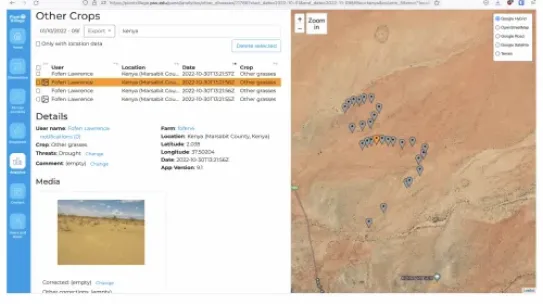 A digital dashboard from PlantVillage showing a satellite map of Marsabit County, Kenya. Blue and orange pins track the movement of a local Moran through the landscape to identify viable grazing lands and areas needing ecosystem regeneration.