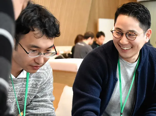 Members of startups discussing among each other.