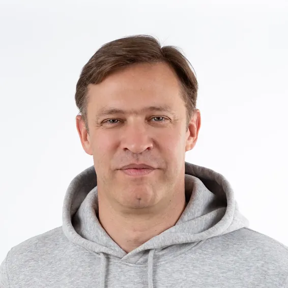 Portrait of the quote's author wearing a hoodie.