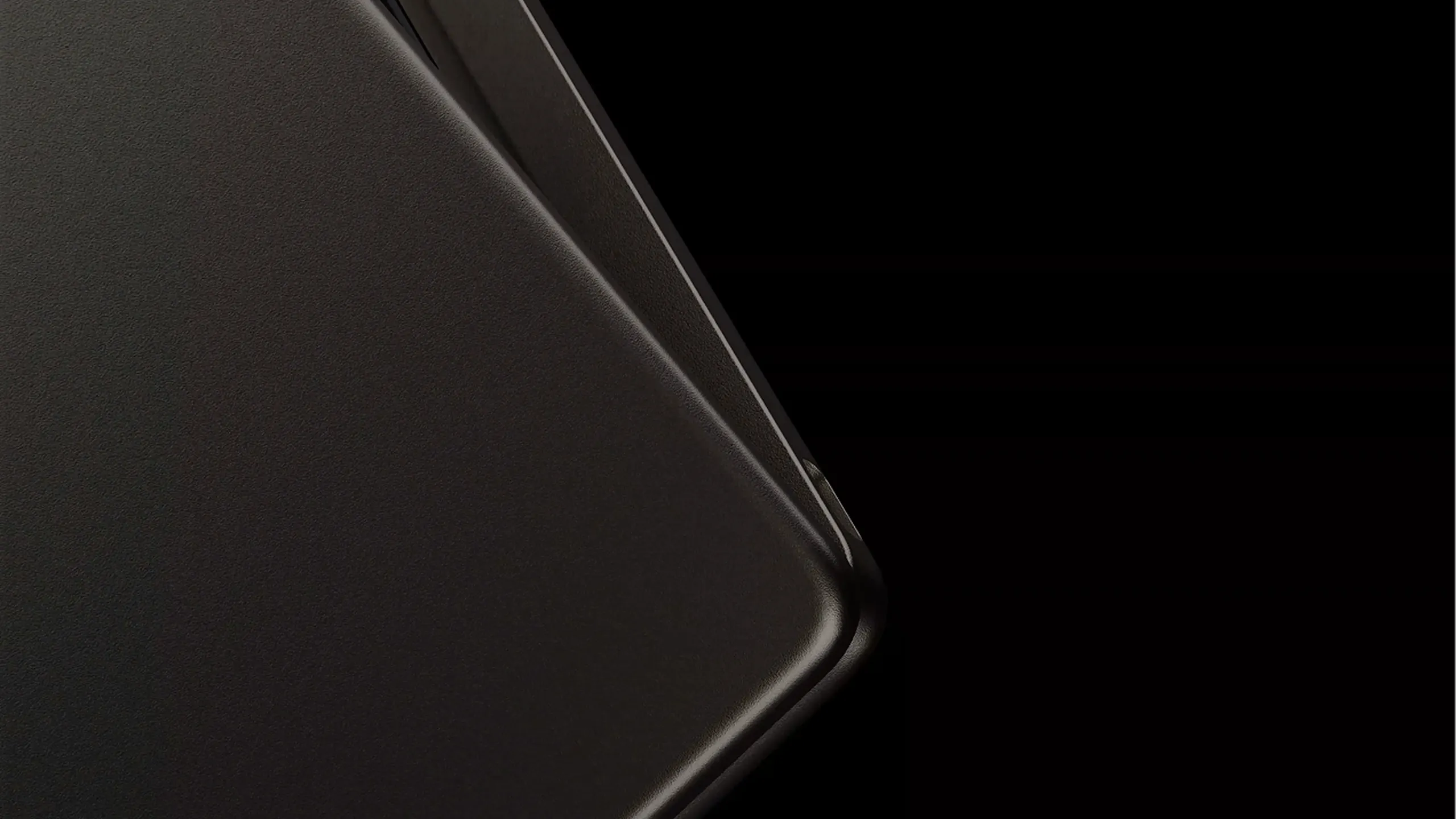 Close-up detail shot of the corner of a laptop.