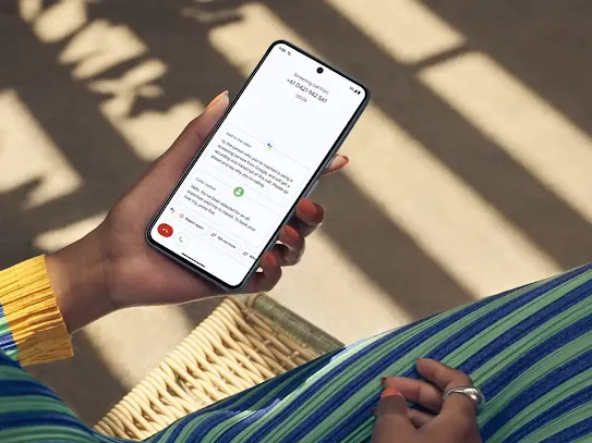 Woman uses her Android phone to send messages